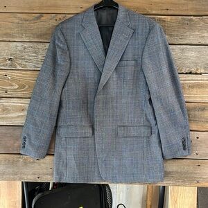 Tailored black and grey sport coat. Dry cleaned and very comfortable.